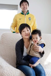 Warabi, Saitama prefecture, March 17 2013 - Portrait of Tomoko Ida, her husband Andre and her son Lukas.