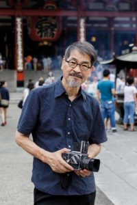 Tokyo, July 28 2015 - Portrait of Japanese photographer Hiroh Kikai in Asakusa's Senso-ji, where he took his famous black and white portraits.