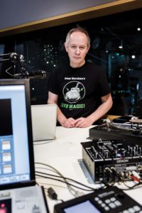Tokyo, December 14 2014 - Portrait of Peter Barakan, DJ and broadcaster, at InterFM Radio before his Sunday evening show.