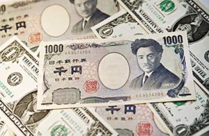 Image #: 4612392 A 1000 yen note is arranged on top of U.S. one dollar notes in New York, U.S., on Friday, March 7, 2008. The dollar fell to the weakest in three years against the yen and to a record low versus the euro on speculation the U.S. jobless rate rose and the Federal Reserve will cut its main interest rate by as much as 100 basis points this month. Photographer: Andrew Harrer/Bloomberg News /Landov